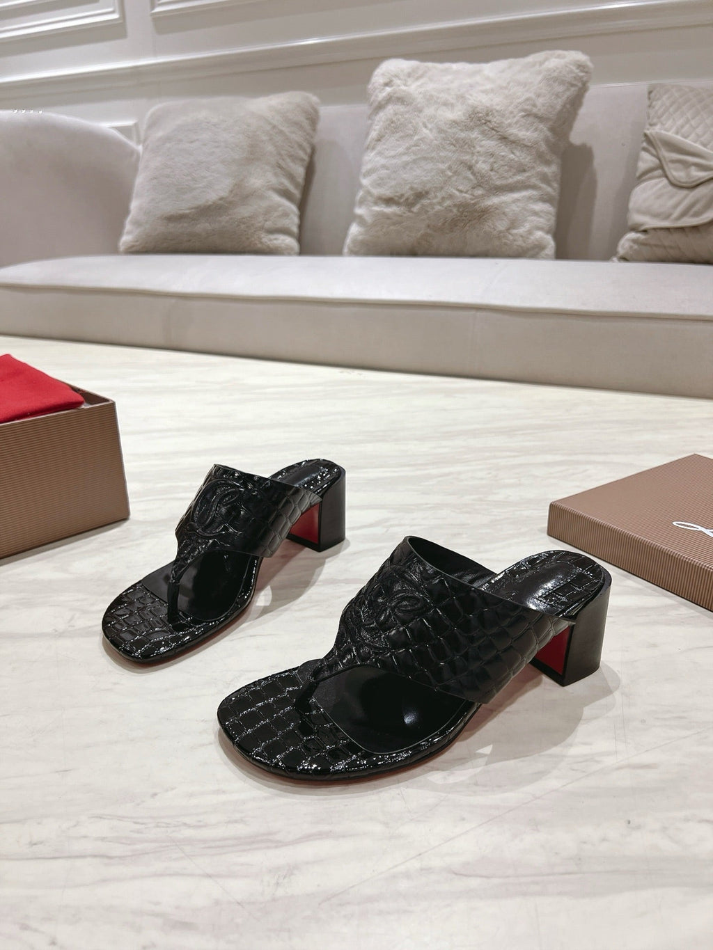 EMBOIDERED LOGO MULES IN BLACK EMBOSSED CALFSKIN