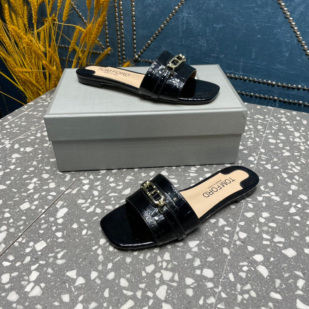 FLAT MULE IN BLACK CALFSKIN