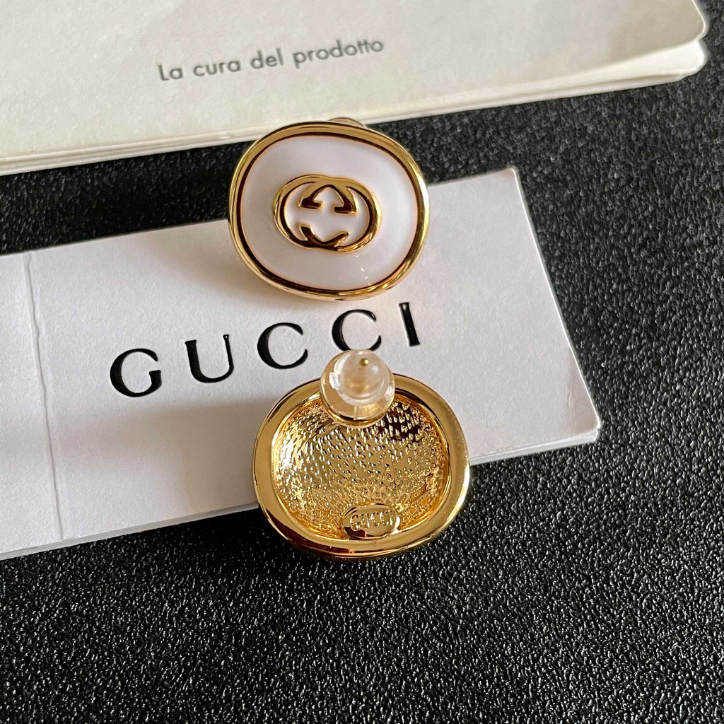 GUCCI 26S INTERLOCKING G ROUND LOGO STUD EARRINGS IN WHITE ENAMEL & GOLD TONE METAL 625717