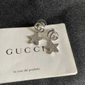 GUCCI 26S DOUBLE G STAR CRYSTAL DROP EARRINGS IN SILVER TONE METAL 627016
