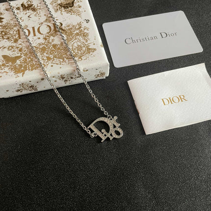 CD 26S CRYSTAL DIOR LOGO PENDANT NECKLACE IN SILVER METAL 631900