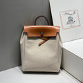 HERBAG A DOS ZIP RETOURNE BACKPACK 29 IN OFF-WHITE CANVAS AND BROWN CALFSKIN