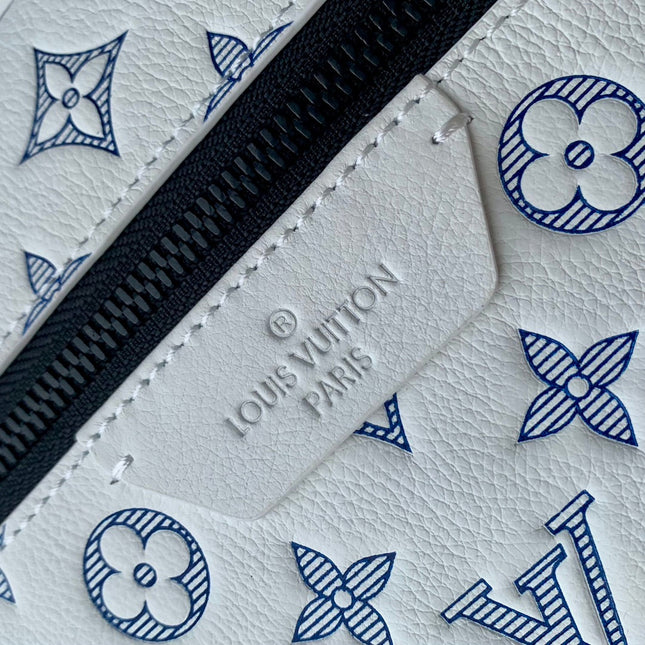 DISCOVERY PM BACKPACK 38 IN WHITE MONOGRAM LAMBSKIN
