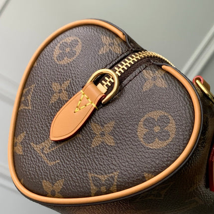 NANO SPEEDY DATING 18 IN BROWN COATED CANVAS GOLD HARDWARE