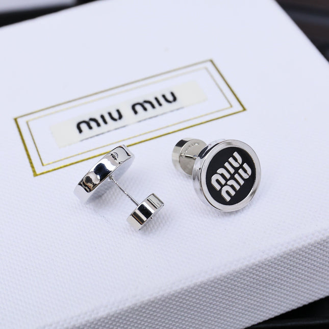 MIUMIU 26S ROUND LOGO STUD EARRINGS IN BLACK ENAMEL AND SILVER TONE METAL 625609