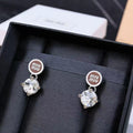 MIUMIU 26S CRYSTAL DROP LOGO STUD EARRINGS IN SILVER TONE METAL 626892