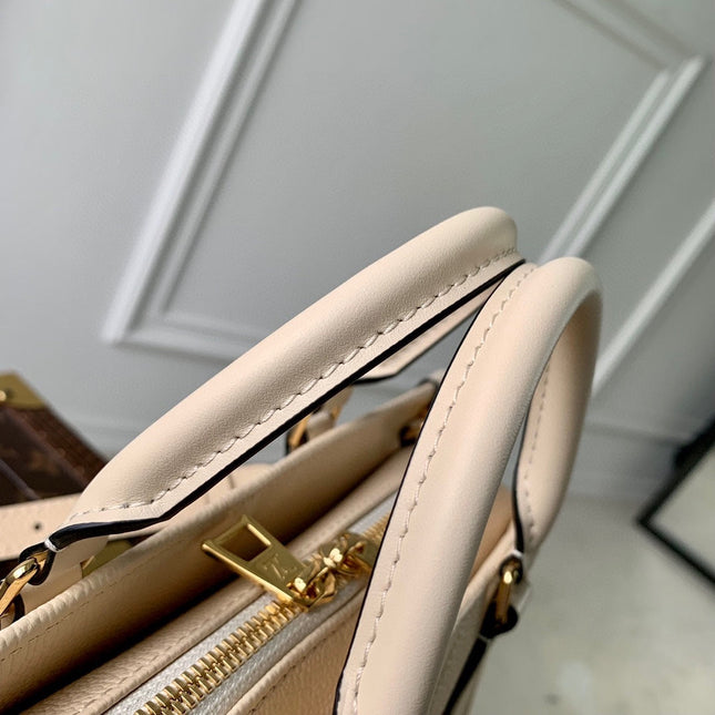 ONTHEGO EAST WEST BAG 25 IN BEIGE MONOGRAM EMBOSSED COWHIDE