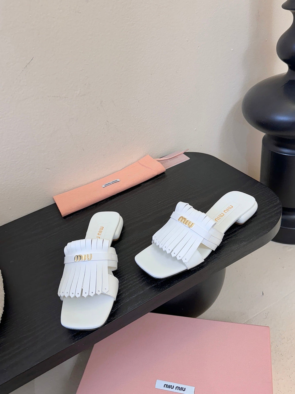 MIUMIU 26S FLAT SLIPPERS IN WHITE CALFSKIN