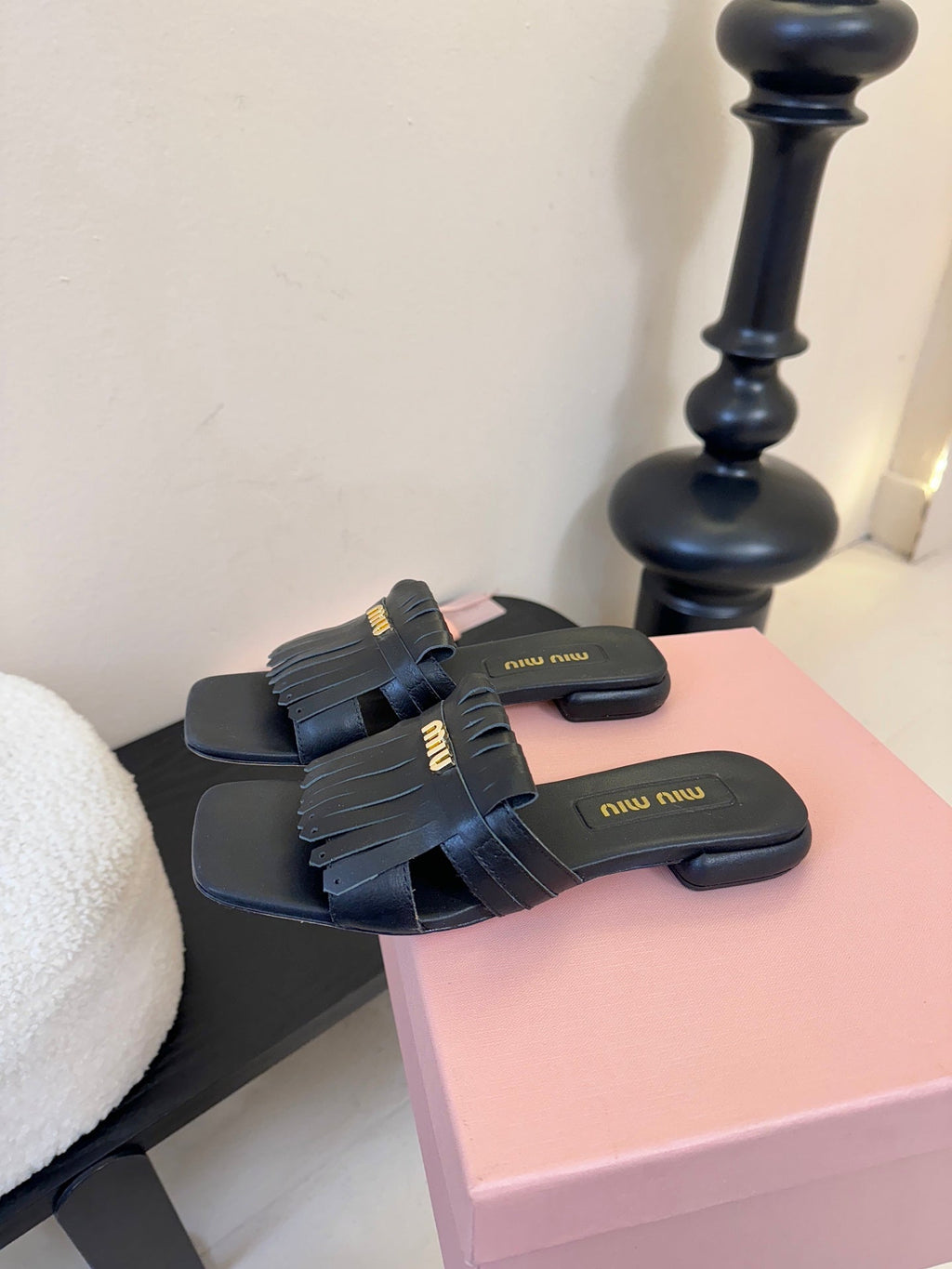MIUMIU 26S FLAT SLIPPERS IN BLACK CALFSKIN