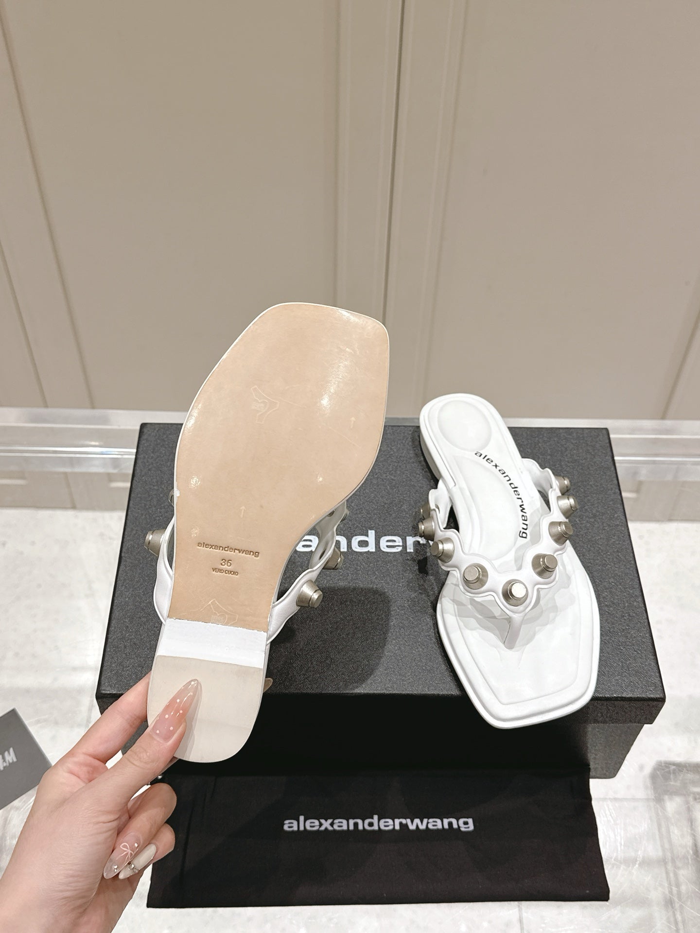 RHODES STUDDED THONG SANDALS IN WHITE CALFSKIN