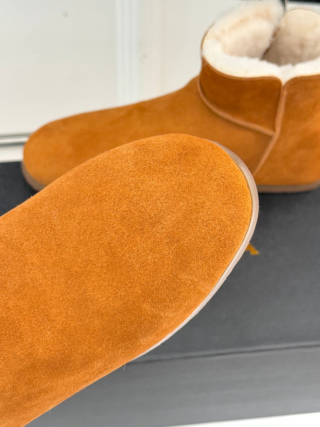 ALAIA 26S SNOW BOOTS IN DARK ORANGE SUEDE AND WOOL