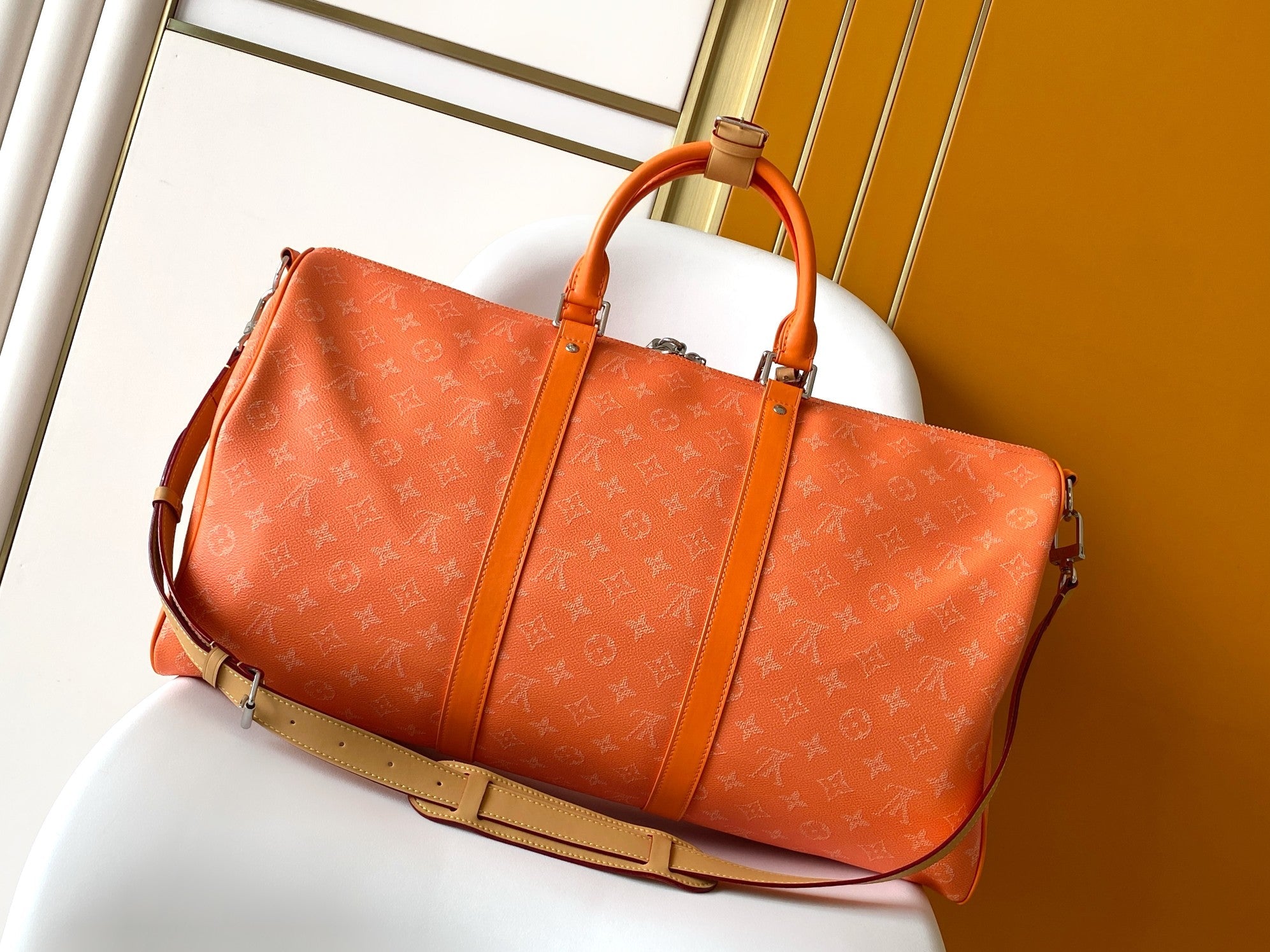 LV 26S KEEPALL 50 IN ORANGE MONOGRAM CANVAS
