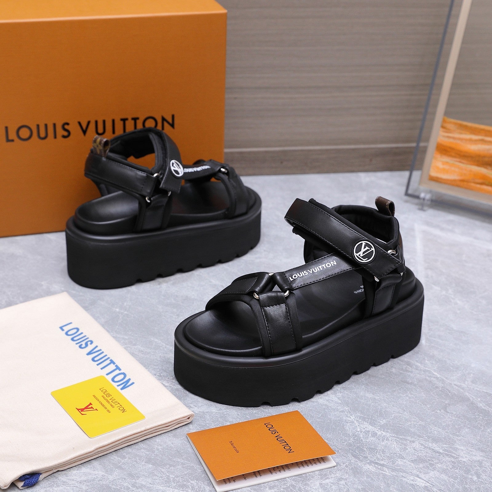 LV 26S CHAMELEON PLATFORM SANDALS 60MM IN BLACK CALFSKIN AND EVA