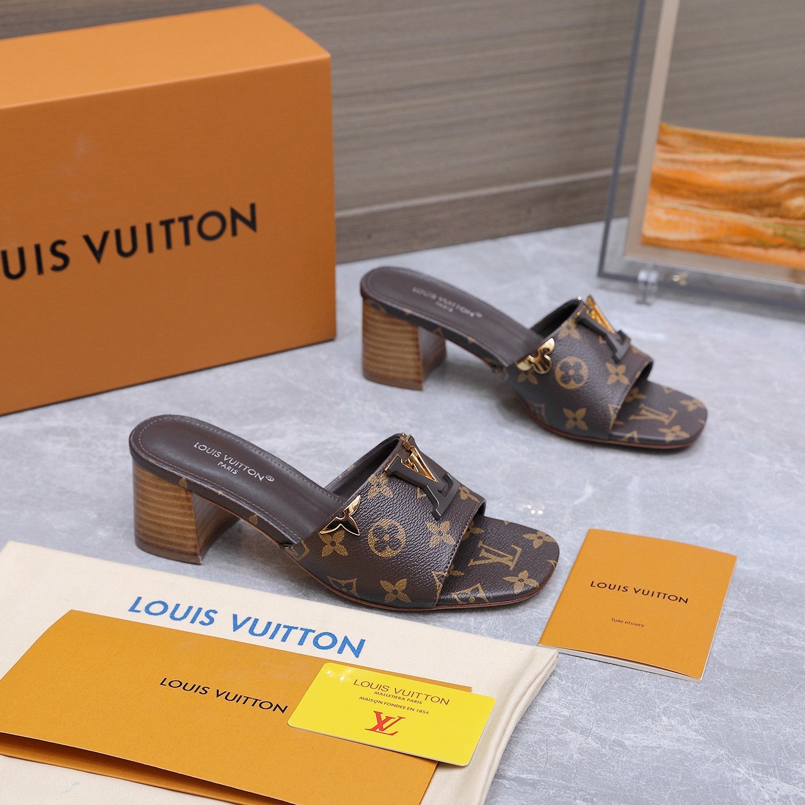 LV 26S BLOCK HEEL MULE SANDALS 55MM IN DARK BROWN MONOGRAM CALFSKIN GOLD HARDWARE