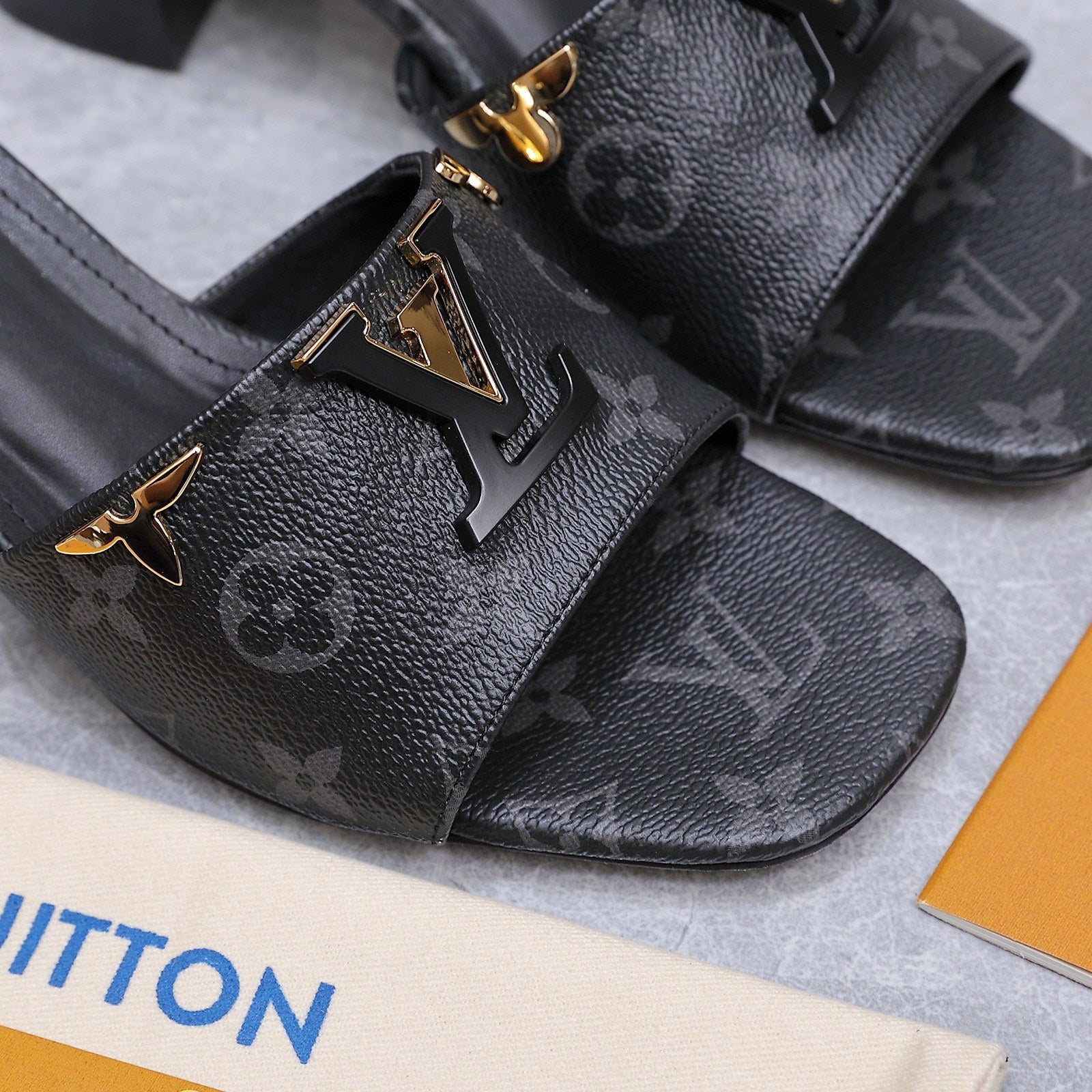 LV 26S BLOCK HEEL MULE SANDALS 55MM IN BLACK MONOGRAM CALFSKIN GOLD HARDWARE
