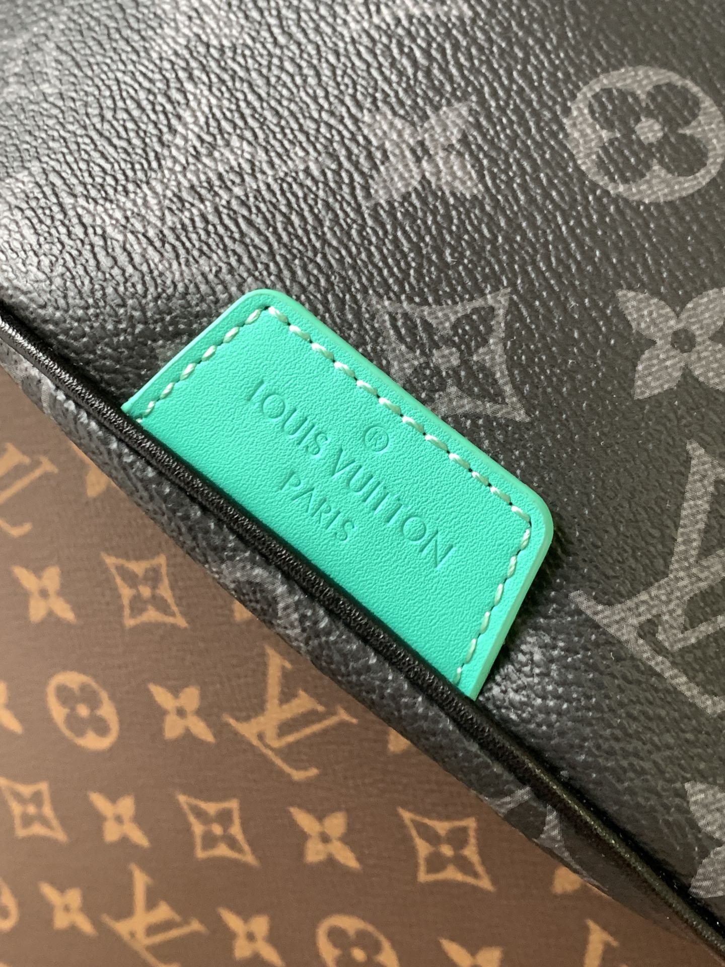 LV 25S DISCOVERY BUMBAG 44 IN BLACK AQUA MONOGRAM ECLIPSE CANVAS AND CALFSKIN