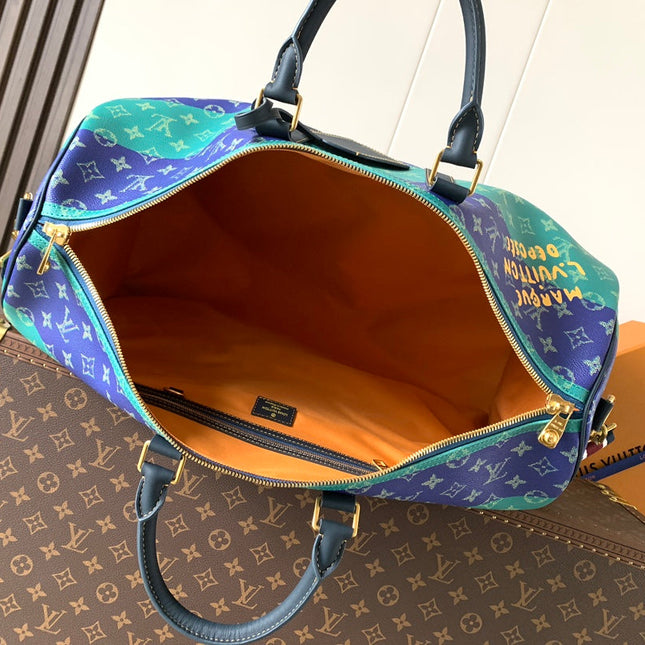 LV 26S KEEPALL 50 IN BLUE WITH LIGHT BLUE ACCENTS COATED CANVAS