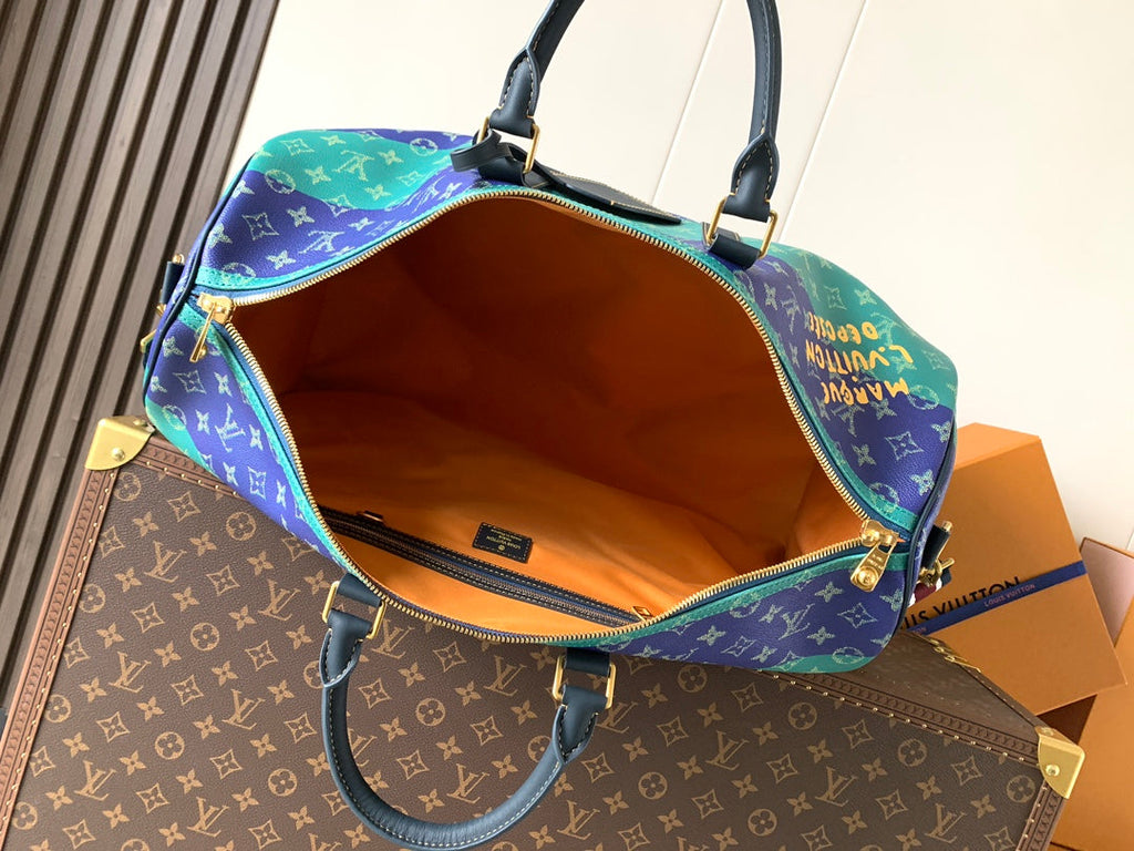 LV 26S KEEPALL 50 IN BLUE WITH LIGHT BLUE ACCENTS COATED CANVAS