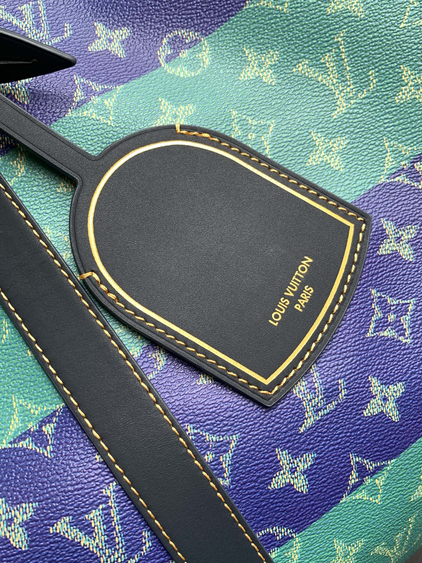 LV 26S KEEPALL 50 IN BLUE WITH LIGHT BLUE ACCENTS COATED CANVAS