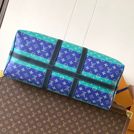 LV 26S KEEPALL 50 IN BLUE WITH LIGHT BLUE ACCENTS COATED CANVAS