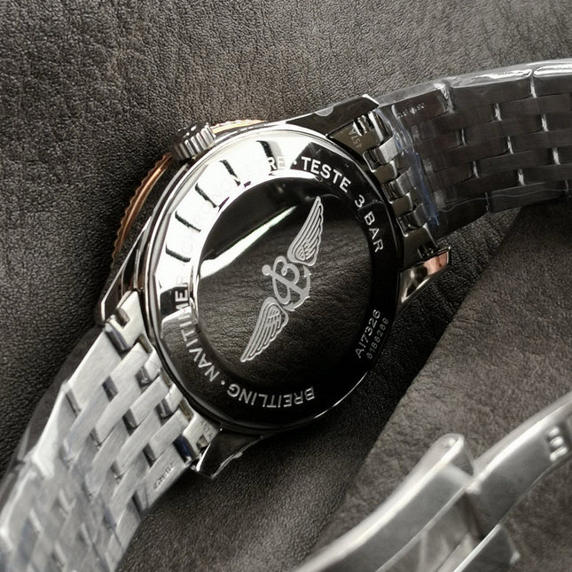 NAVITIMER AUTOMATIC 41 RED GOLD BEZEL WHITE AND BLACK DIAL