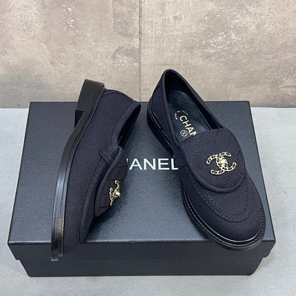 CHANEL 26S LOAFERS IN BLACK CANVAS WITH QUILTED FLAP & CHAIN CC LOGO