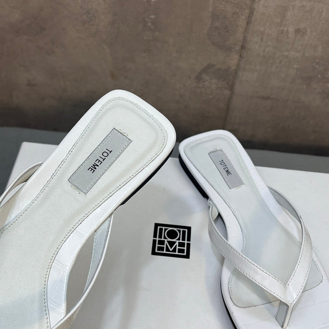 THE ROW 26S SQUARE TOE THONG SANDALS IN WHITE CROCODILE EMBOSSED CALFSKIN