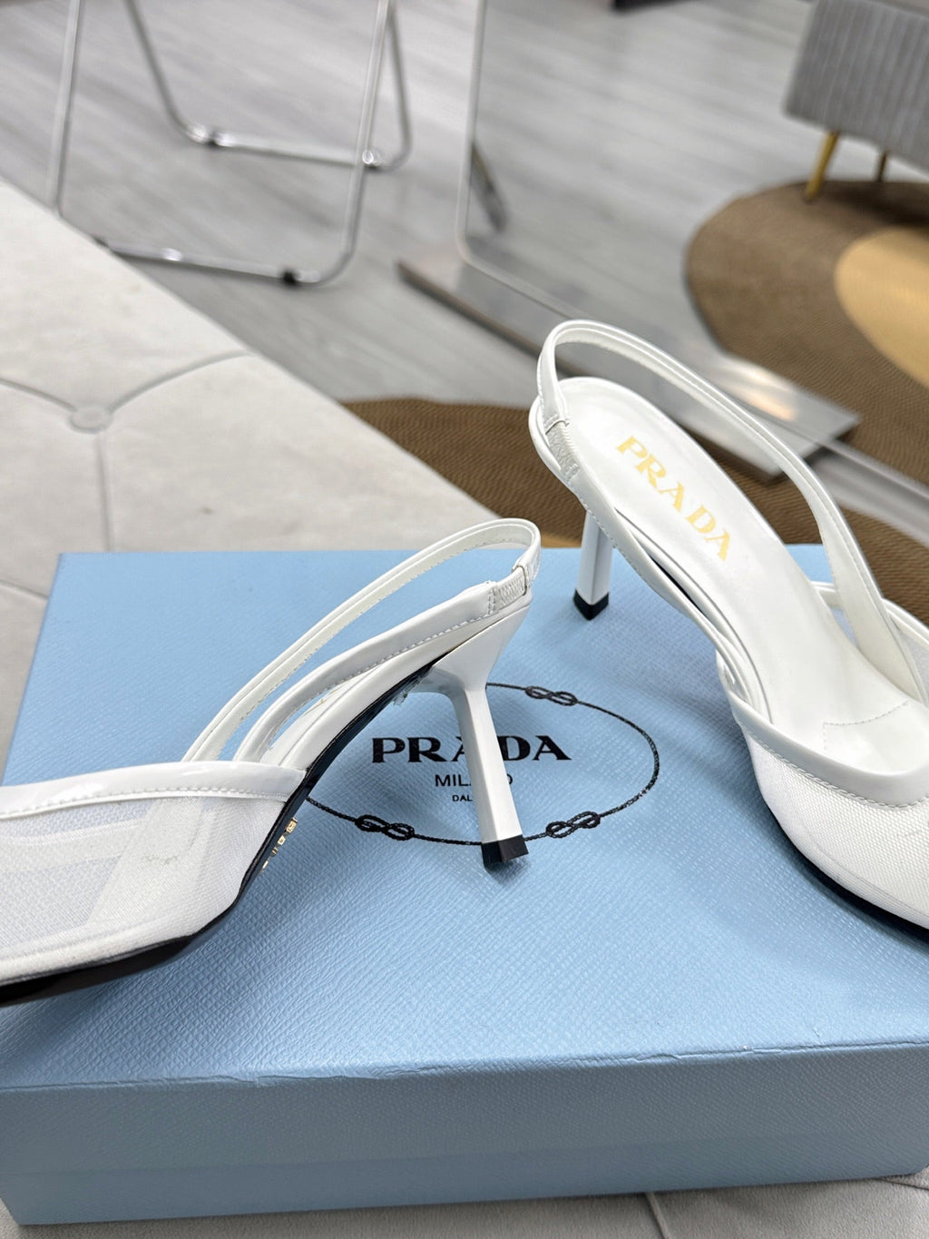 PRADA 25S TRIANGLE LOGO SLINGBACK PUMPS IN WHITE MESH FABRIC
