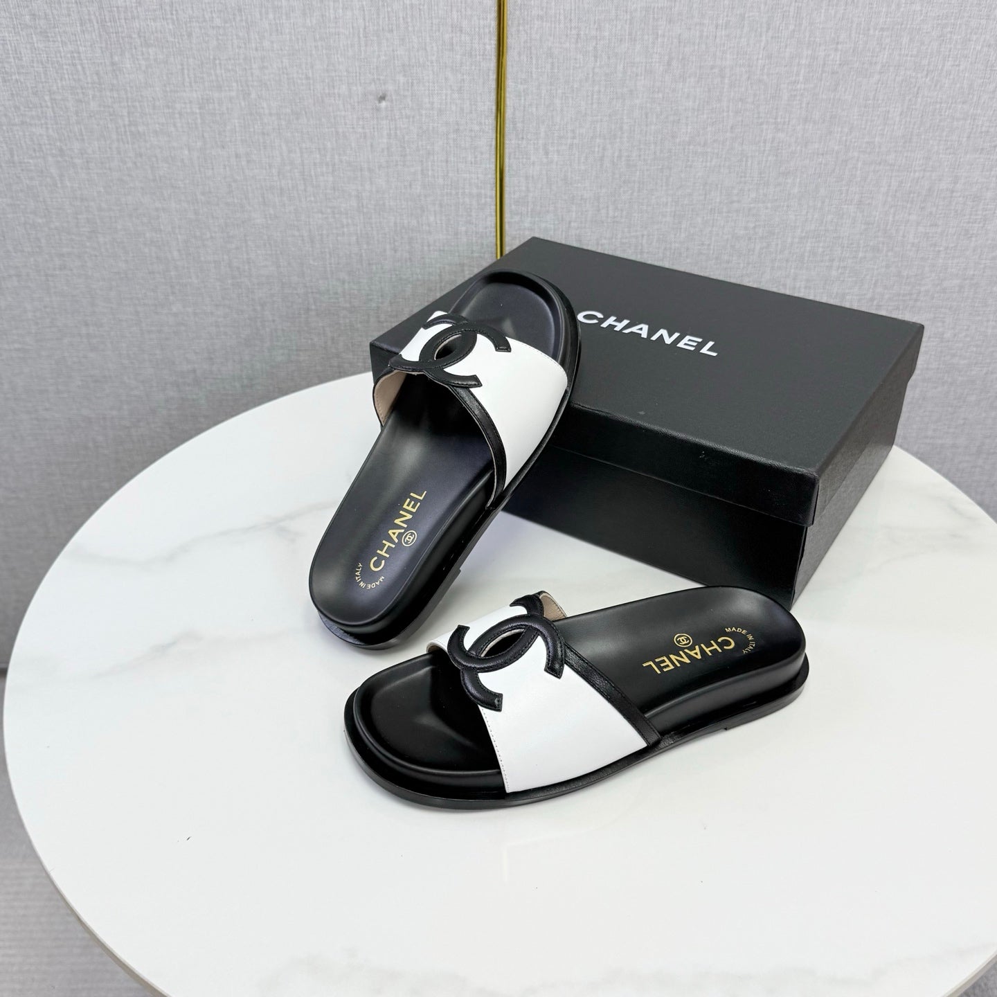 CHANEL 26S ICONIC CC SLIDES IN WHITE LAMBSKIN