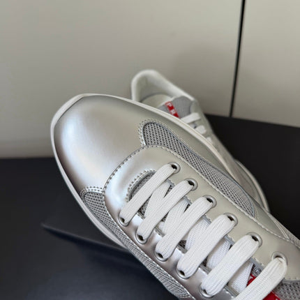 PRADA 26S SNEAKERS IN SILVER CALFSKIN AND WHITE MESH