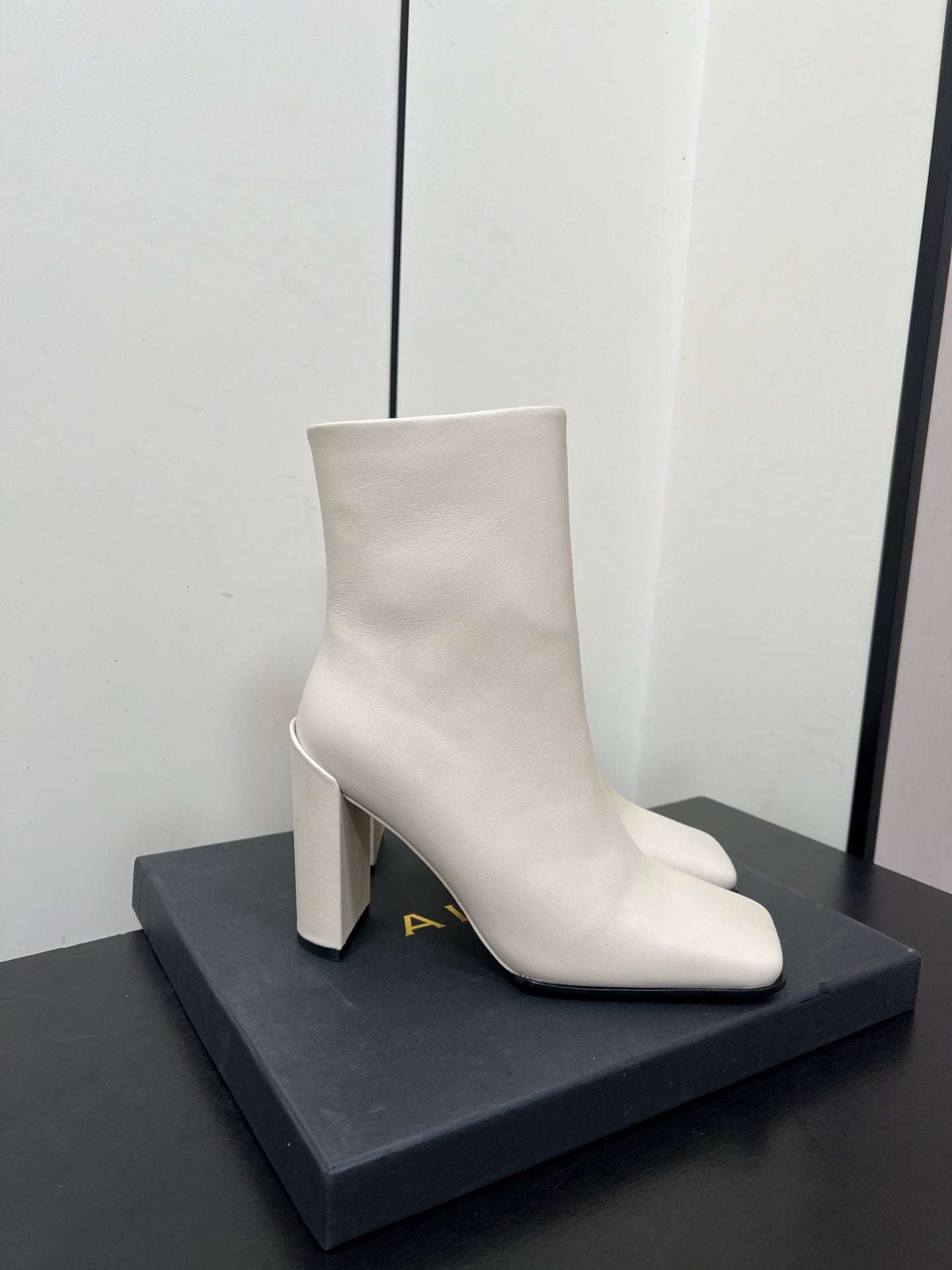 ALAIA 26S SQUARE-TOE BOOTS IN WHITE CALFSKIN