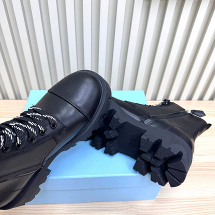 PRADA 25S MONOLITH BOOTS IN BLACK CALFSKIN