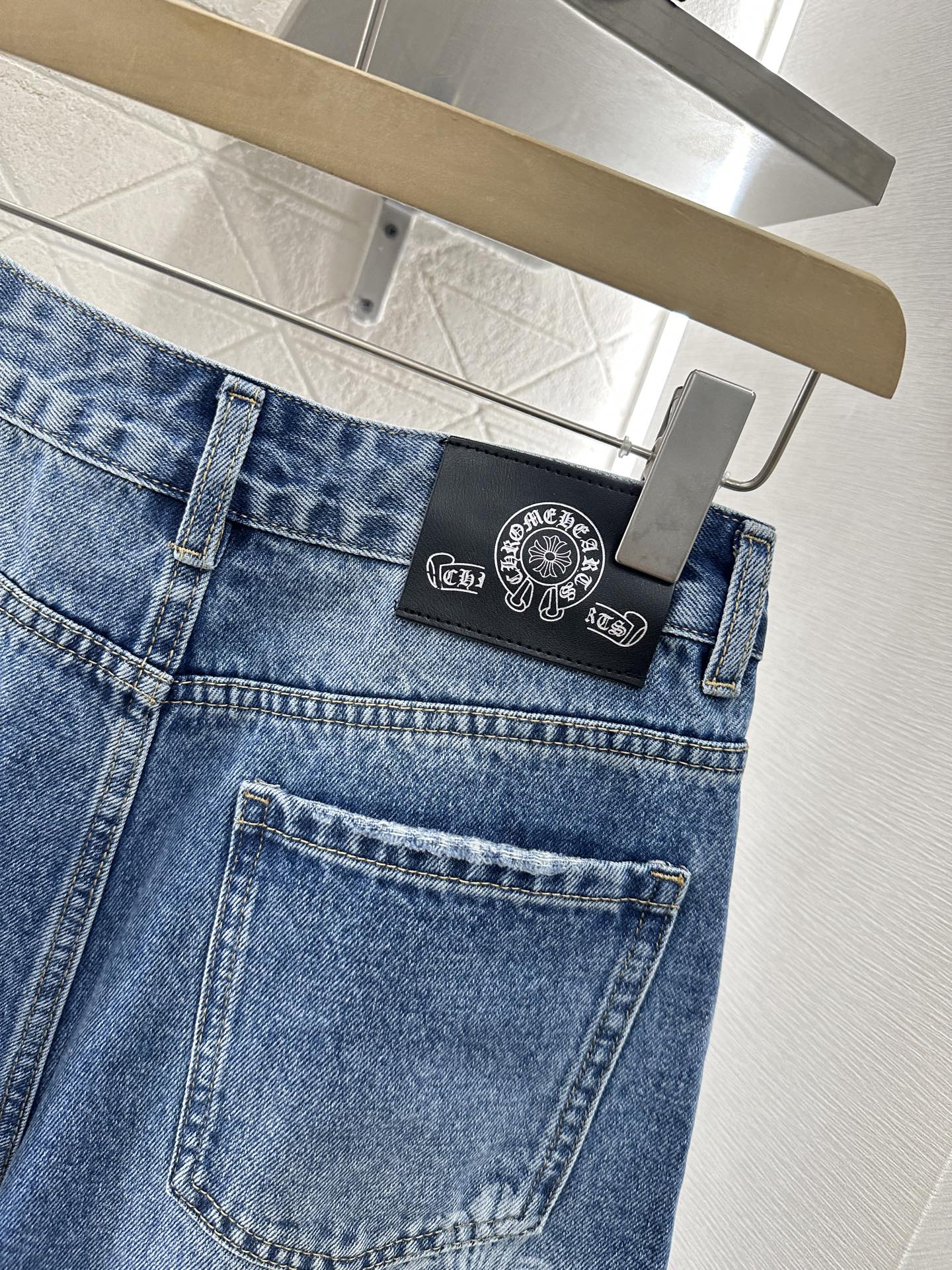 CHROME HEARTS HIGH-WAIST LASER-CUT DENIM PANTS