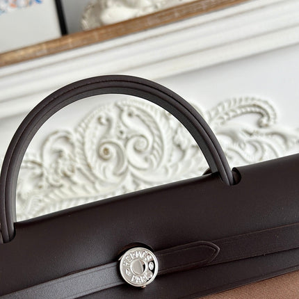 ZIP CABINE 31 BAG IN CHOCOLATE BROWN CANVAS AND BLACK CALFSKIN