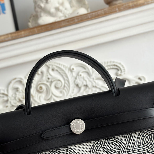 HERBAG ZIP 31 LAQUERED BAG IN OFF-WHITE MIX BLACK H PLUME CANVAS