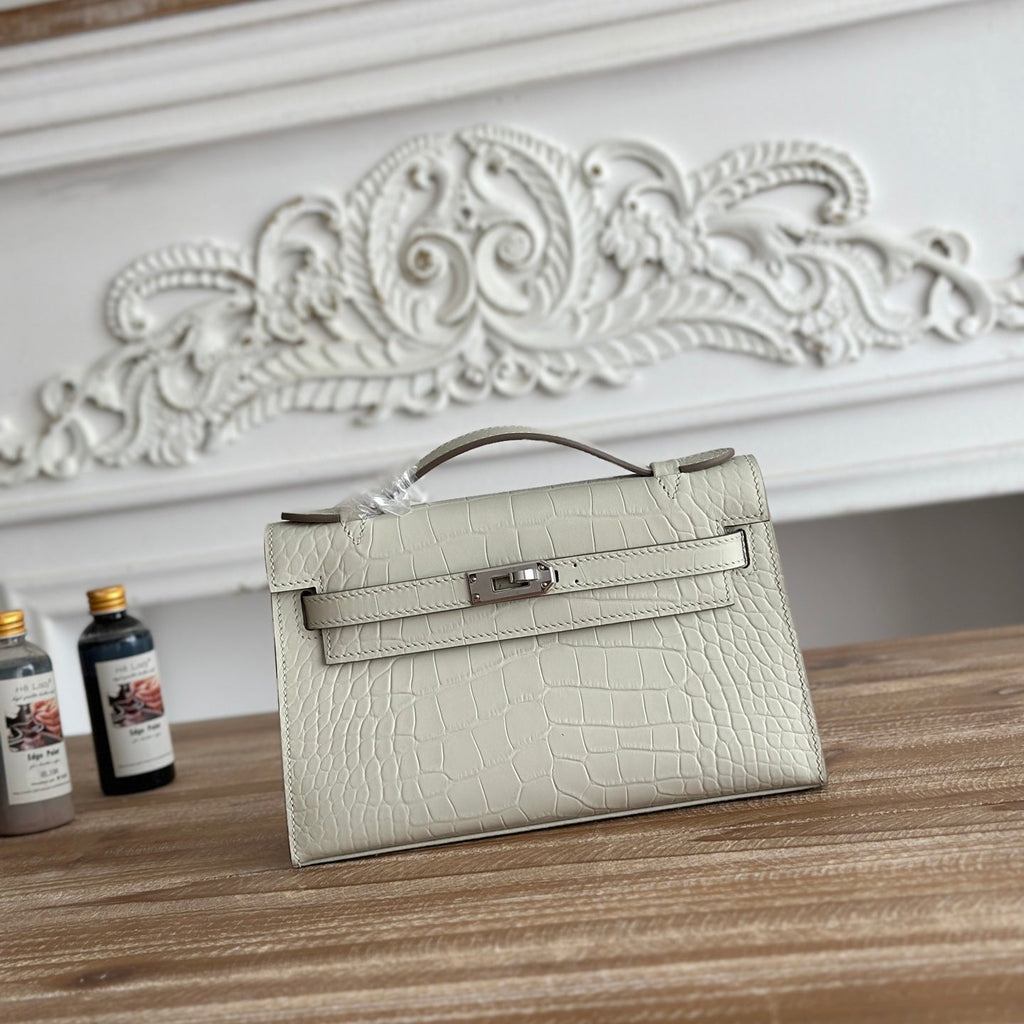 HM 25S KELLY MINI 22 CM IN CREAM WHITE LAMBSKIN WITH CROCODILE EMBOSSING AND SILVER HARDWARE