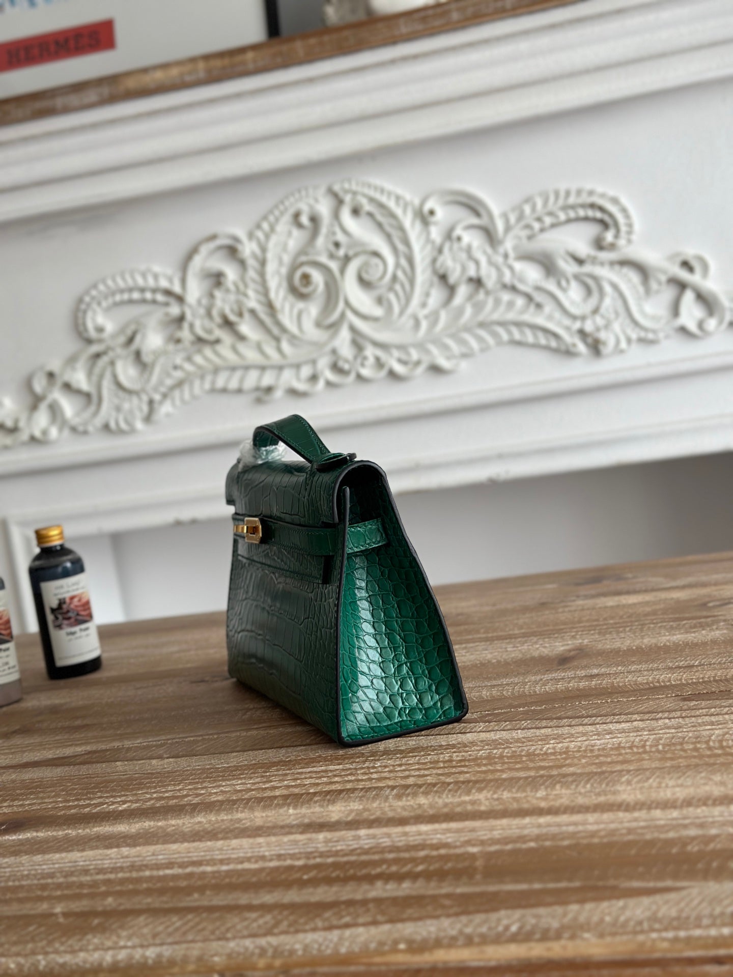 HM 25S KELLY MINI 22 CM IN DARK GREEN LAMBSKIN WITH CROCODILE EMBOSSING AND GOLD HARDWARE