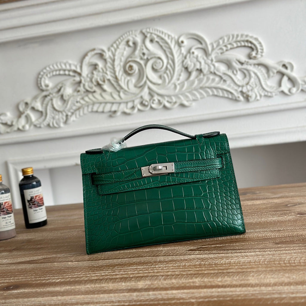 HM 25S KELLY MINI 22 CM IN DARK GREEN LAMBSKIN WITH CROCODILE EMBOSSING AND SILVER HARDWARE