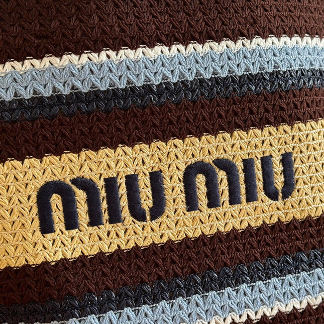 TOTE BAG 40 IN STRIPED PATTERN OF BROWN BLUE AND YELLOW WOVEN RAFFIA
