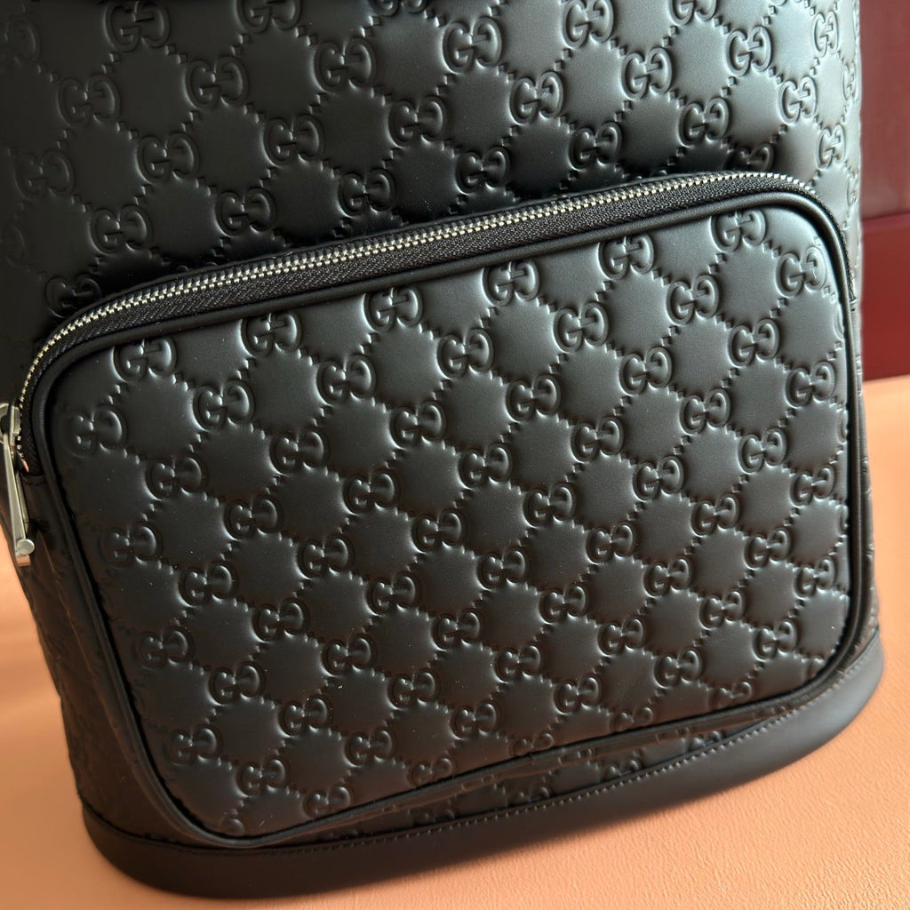 GUCCI 26S GG EMBLEM BACKPACK 44 IN BLACK EMBOSSED CALFSKIN