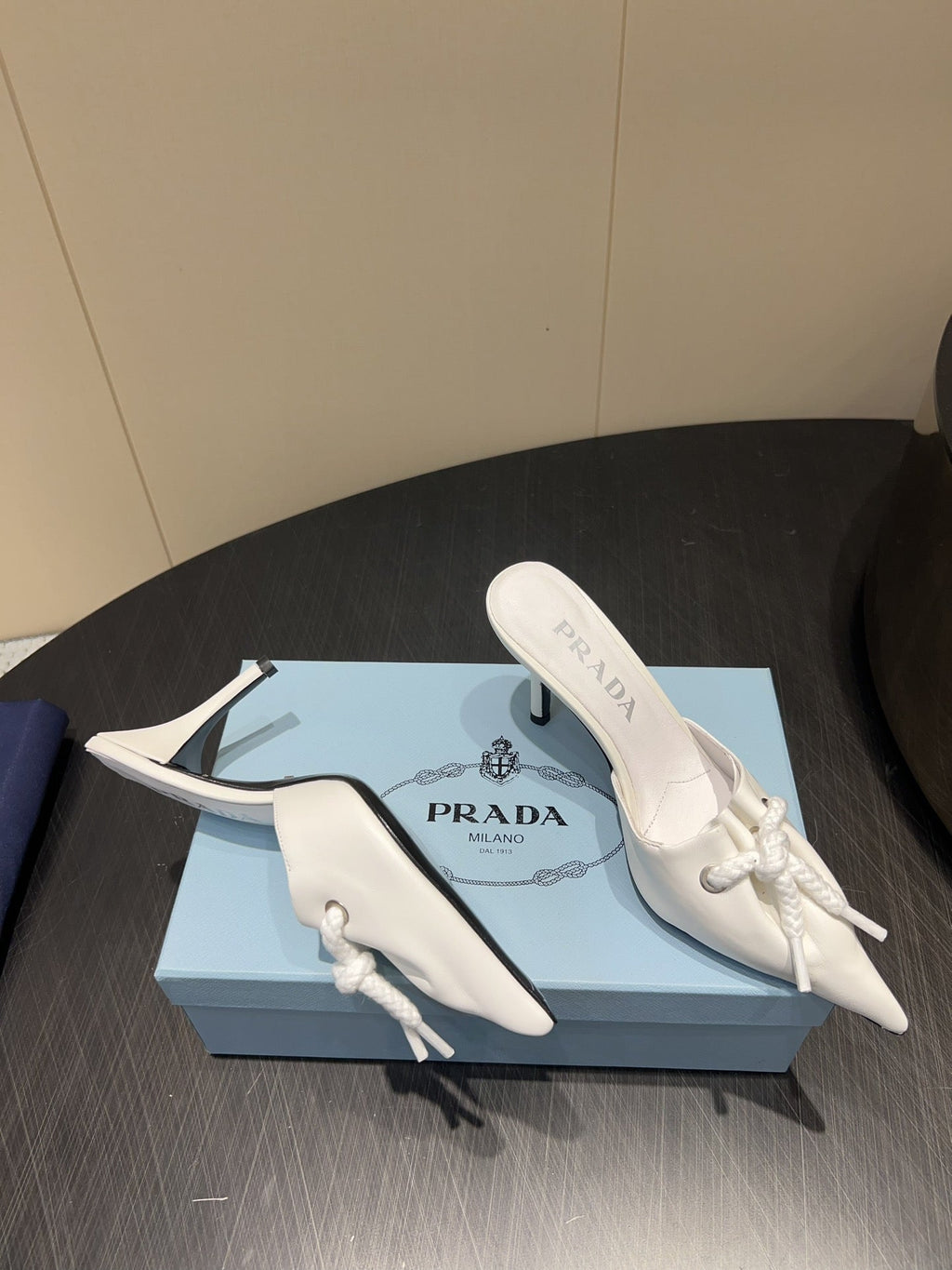 PRADA 25S BRAIDED DETAIL MULES 85MM IN WHITE CALFSKIN