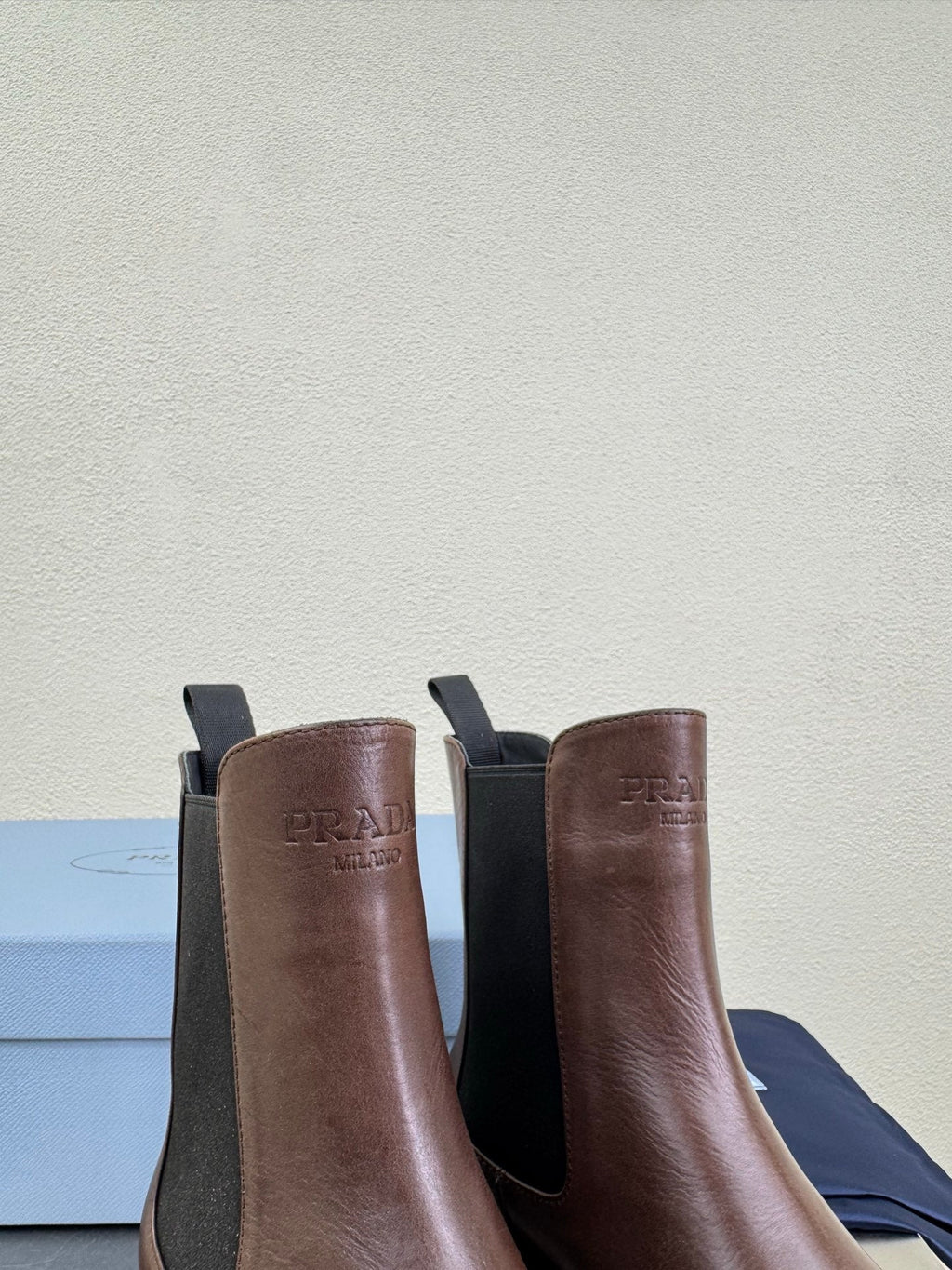PRADA 25S PLATFORM CHELSEA BOOTS IN DARK BROWN CALFSKIN