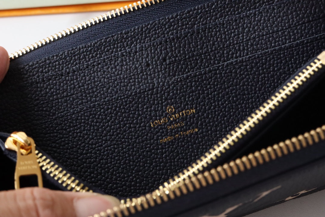 LV MONOGRAM LONG WALLET 20 IN BLACK AND CREAM GRAINED CALFSKIN