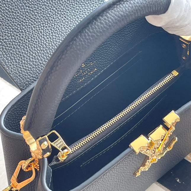 CAPUCINES EAST-WEST MINI 22 IN BLACK CALFSKIN GOLD HARDWARE