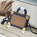 PETITE VALISE 22 IN BROWN MONOGRAM REVERSE CANVAS AND BLACK CALFSKIN TRIM GOLD HARDWARE