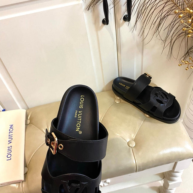 LV 26S ISOLA COMFORT MULES IN BLACK CALFSKIN
