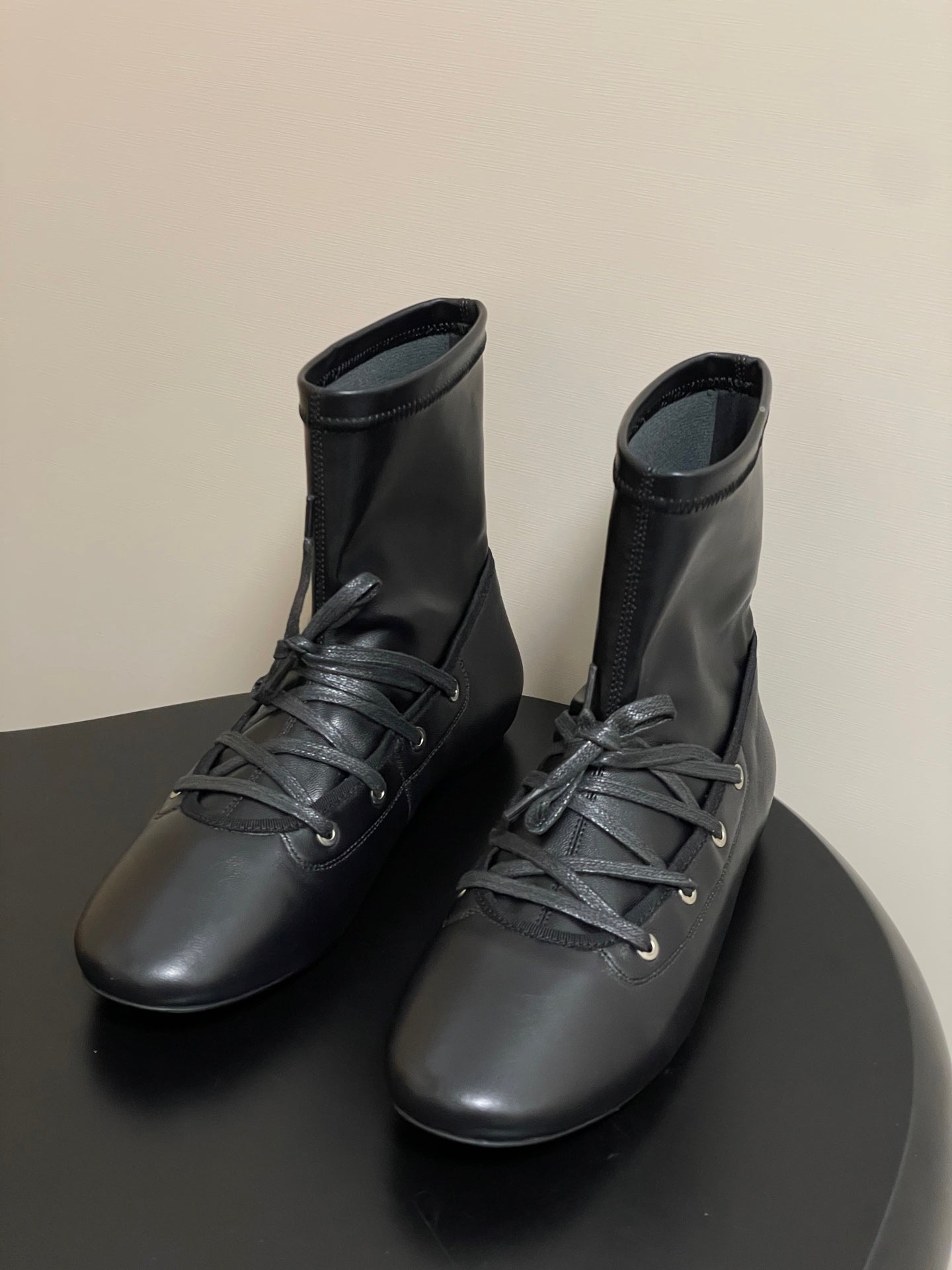 ALO 25S PALOMA WOOL FLAT ANKLE BOOTS IN BLACK LAMBSKIN