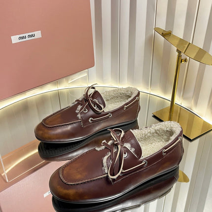 MIUMIU 26S FUR BOAT SHOES IN BROWN CALFSKIN