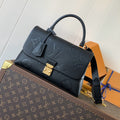MADELEINE 30 IN BLACK MONOGRAM CALFSKIN EMBOSSED LOGO