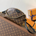 ALMA BE BAG 27 IN BROWN MONOGRAM CANVAS AND COWHIDE